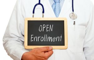 36740725 - open enrollment - doctor with chalkboard