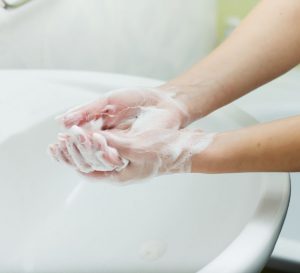 38628641 - washing hands with soap in bathroom. hygiene