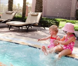 Kids playing by pool